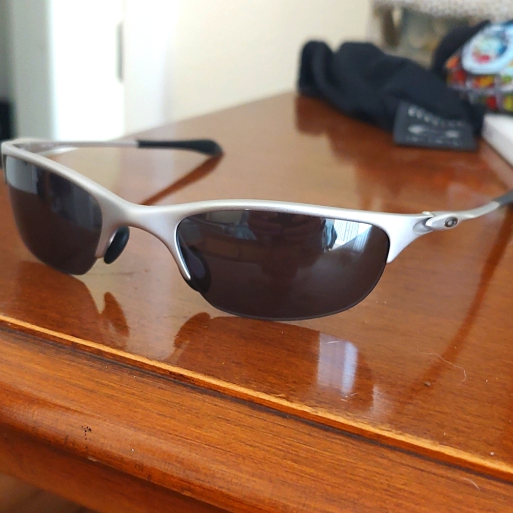 Oakley silver sunglasses